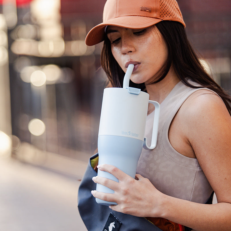 36oz-rise-tumbler-with-straw-lid-u0 36oz_rise_tumbler_straw_girl_sip_square.jpg