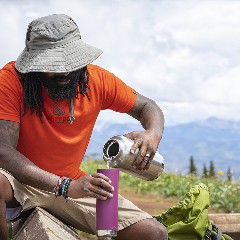 64oz-tkwide-with-loop-cap-u6 tkwide_64oz_bottle_backpacker_mountains_filling_square.jpg