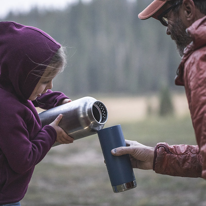 64oz-tkwide-with-loop-cap-u6 tkwide_64oz_bottle_girl_dad_filling_square.jpg